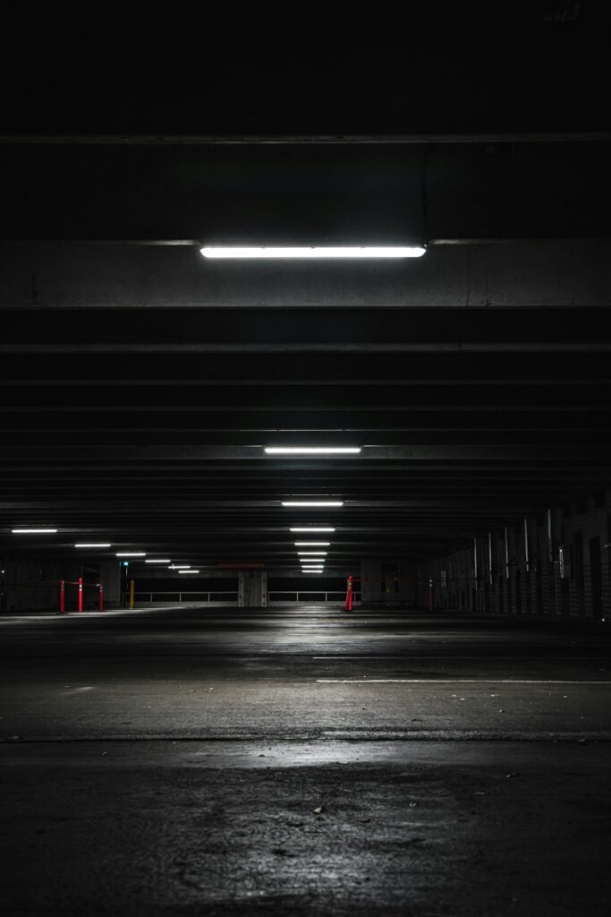 Empty parking garage lit at night