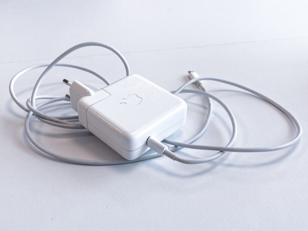 White travel charging adapter