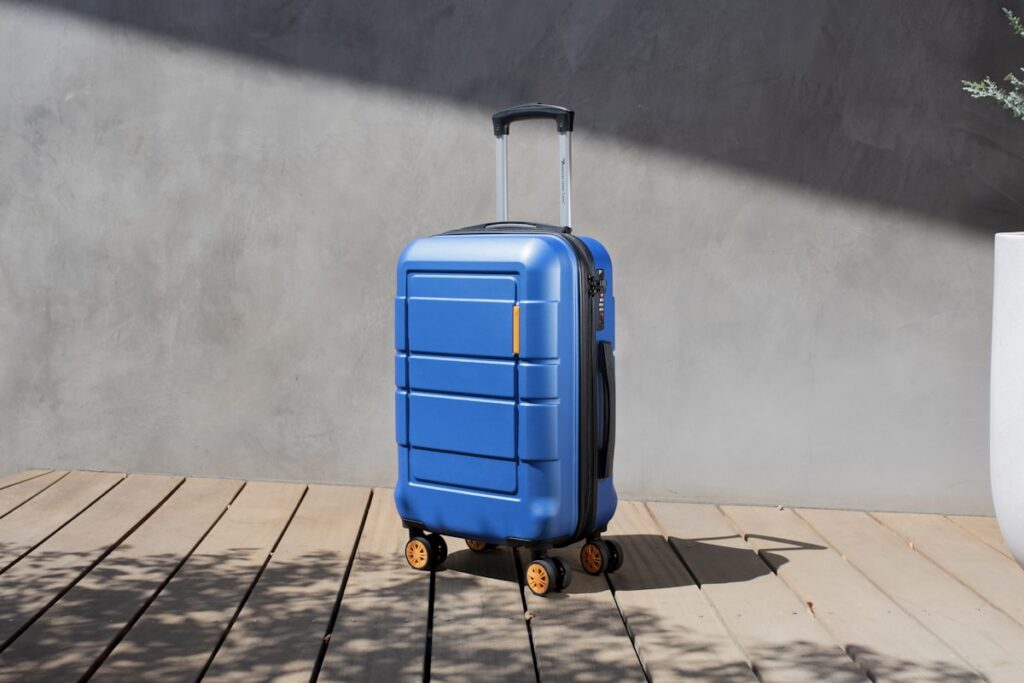 Carry-on suitcase on a wooden floor