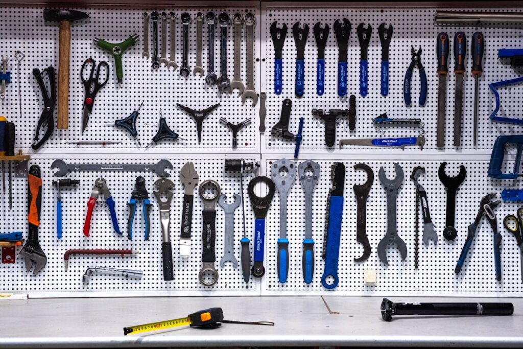 Tools hanging on a pegboard wall