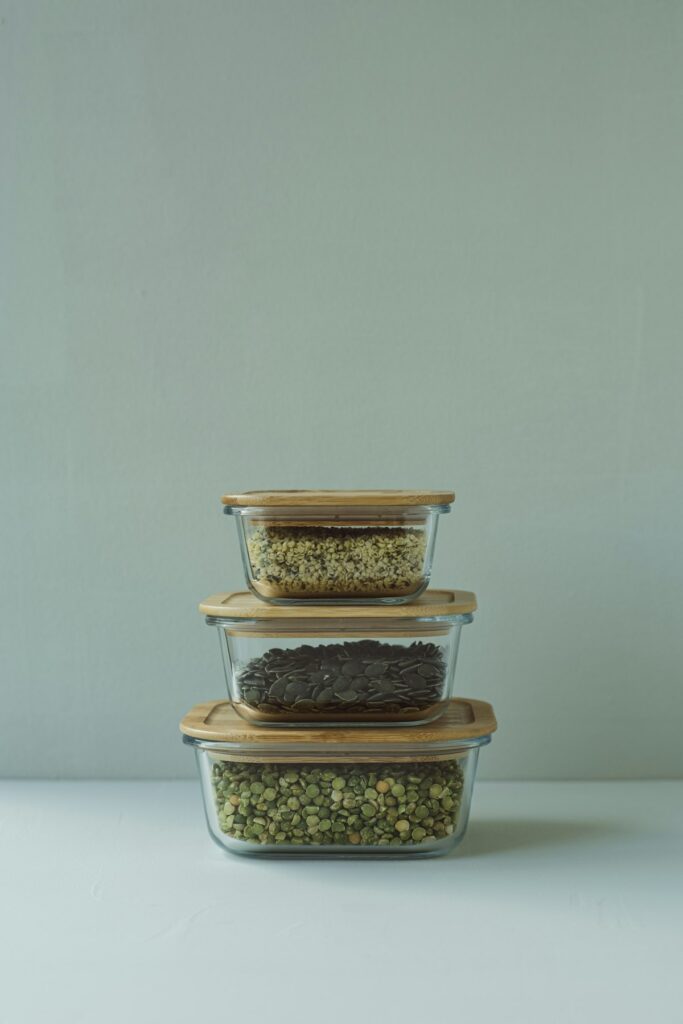 Glass meal prep containers filled with food