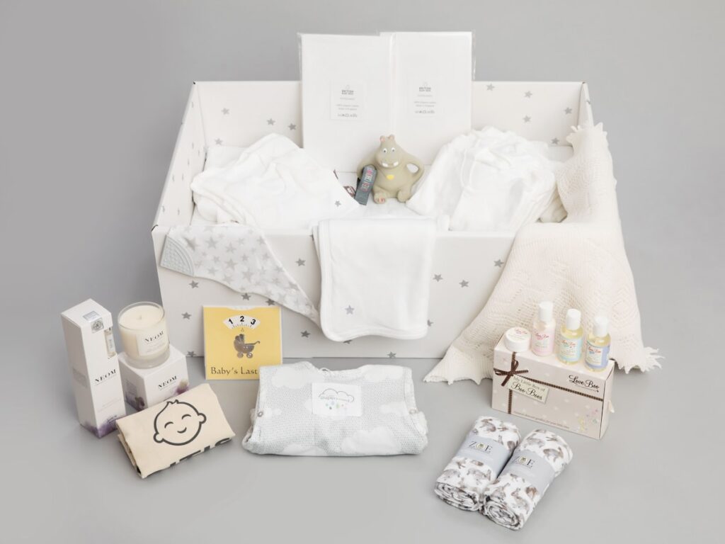Baby gift hamper with contents laid out